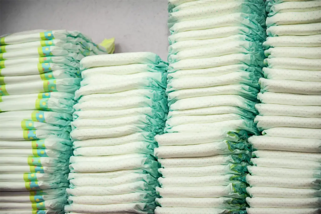 Diapers stacked in a piles in the child room.