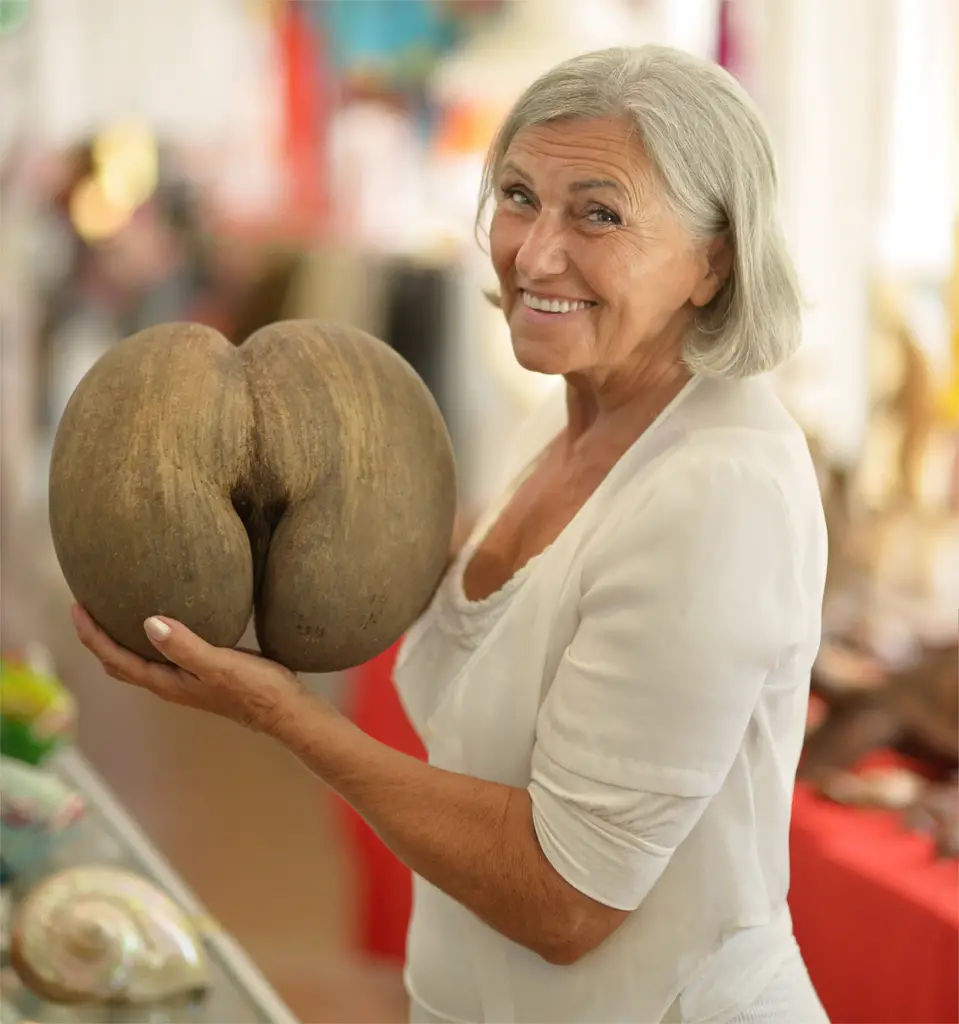 woman with coco de mer seed
