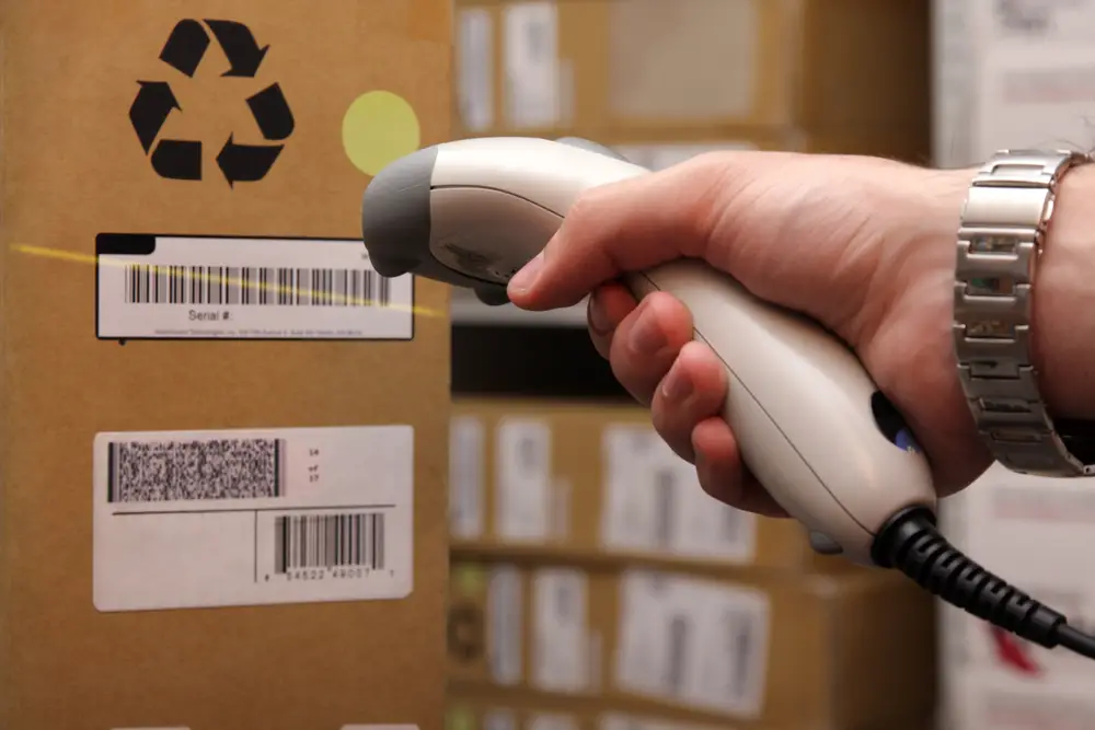 Barcode being scanned on a box