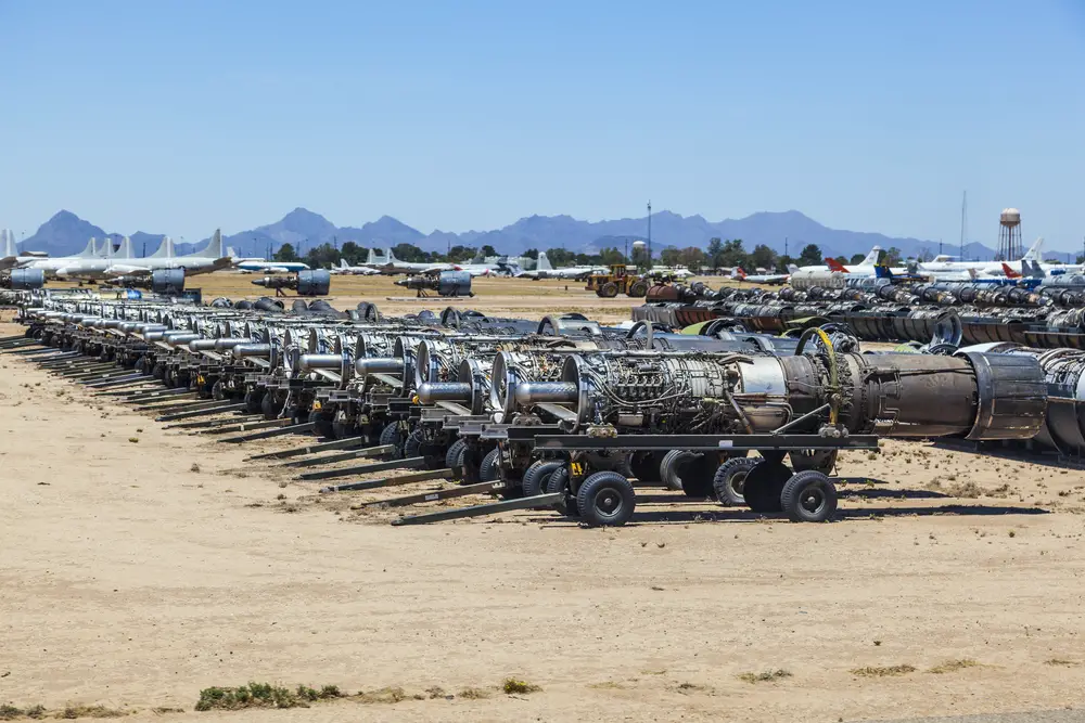 Jet engines in the boneyard lined up.
