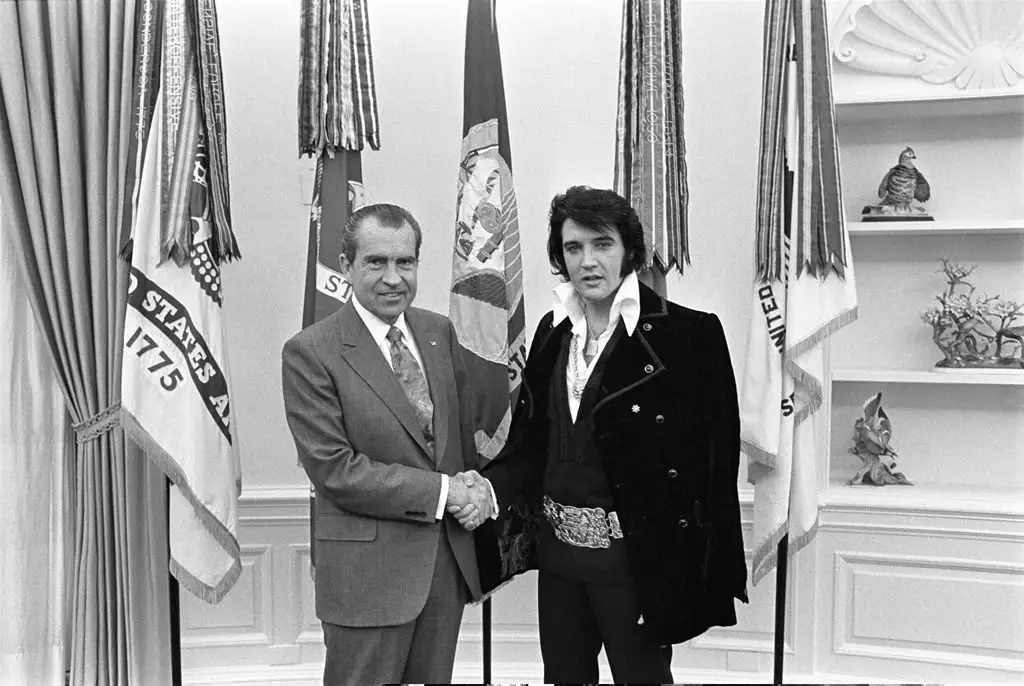 Elvis shaking Nixon's hand in the White House.
