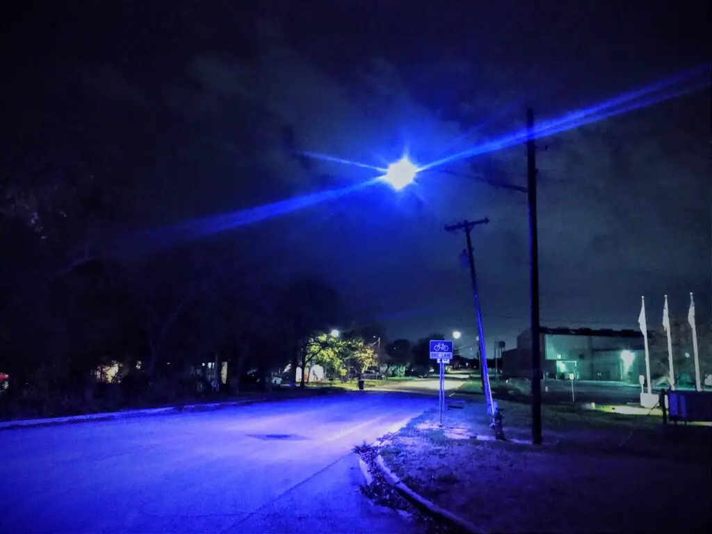 Purple streetlights in a city