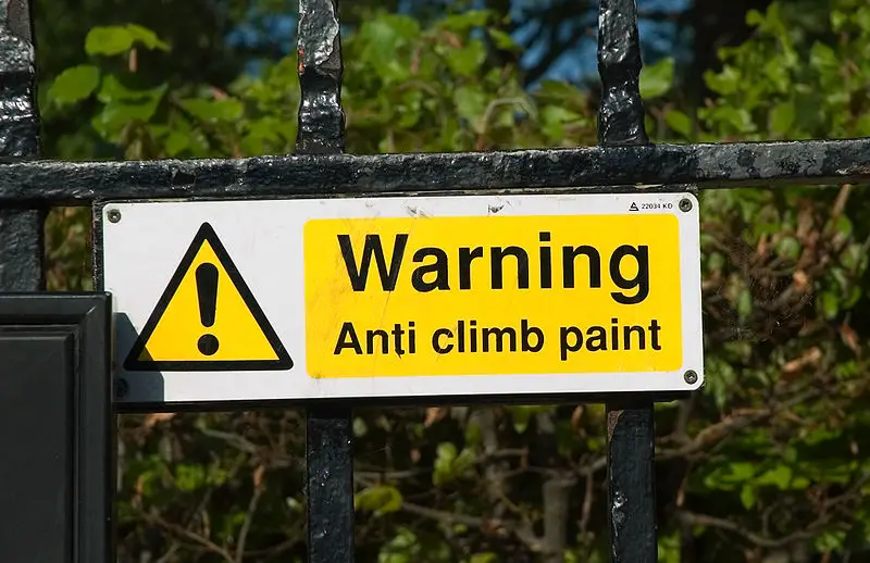 Anti-climb paint warning sign